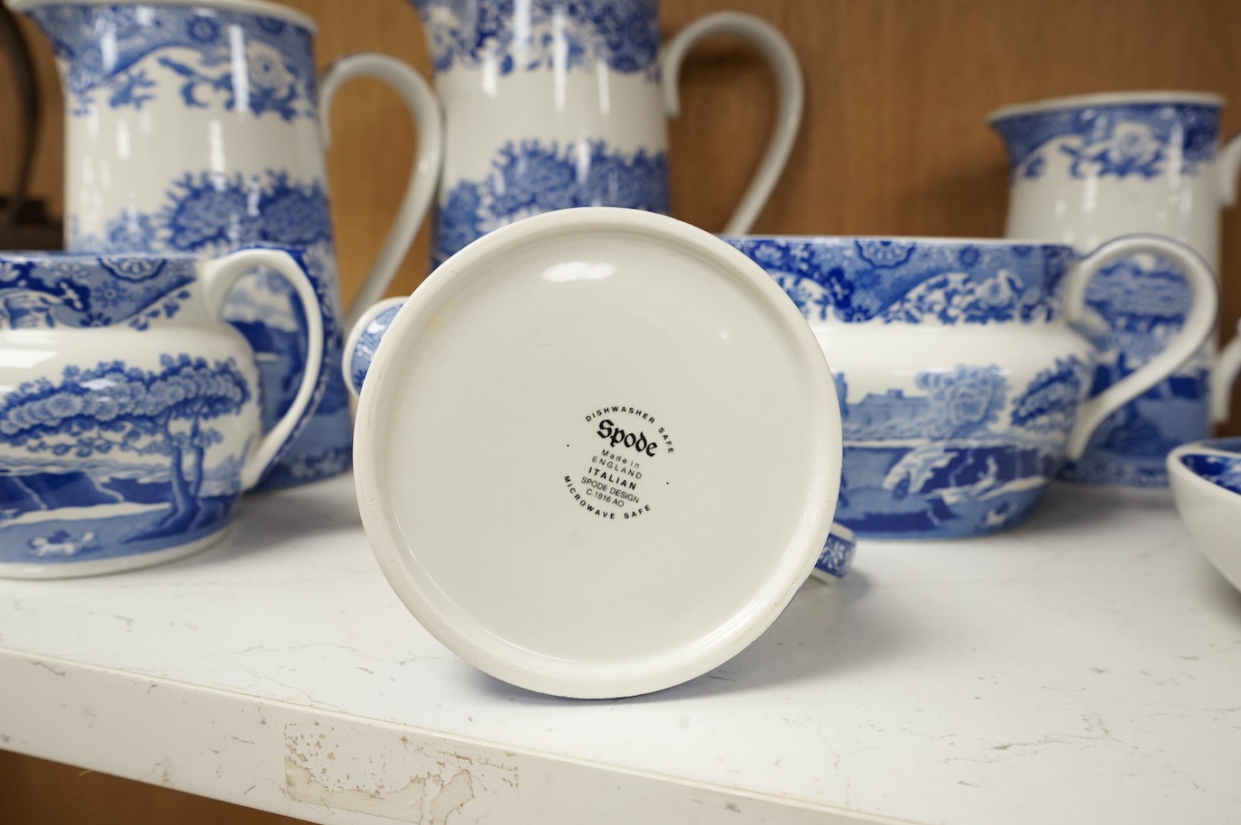 A collection of Spode Italian, comprising graduated jugs, dishes, pickle dishes, pots etc.(23). Largest 20.5cm